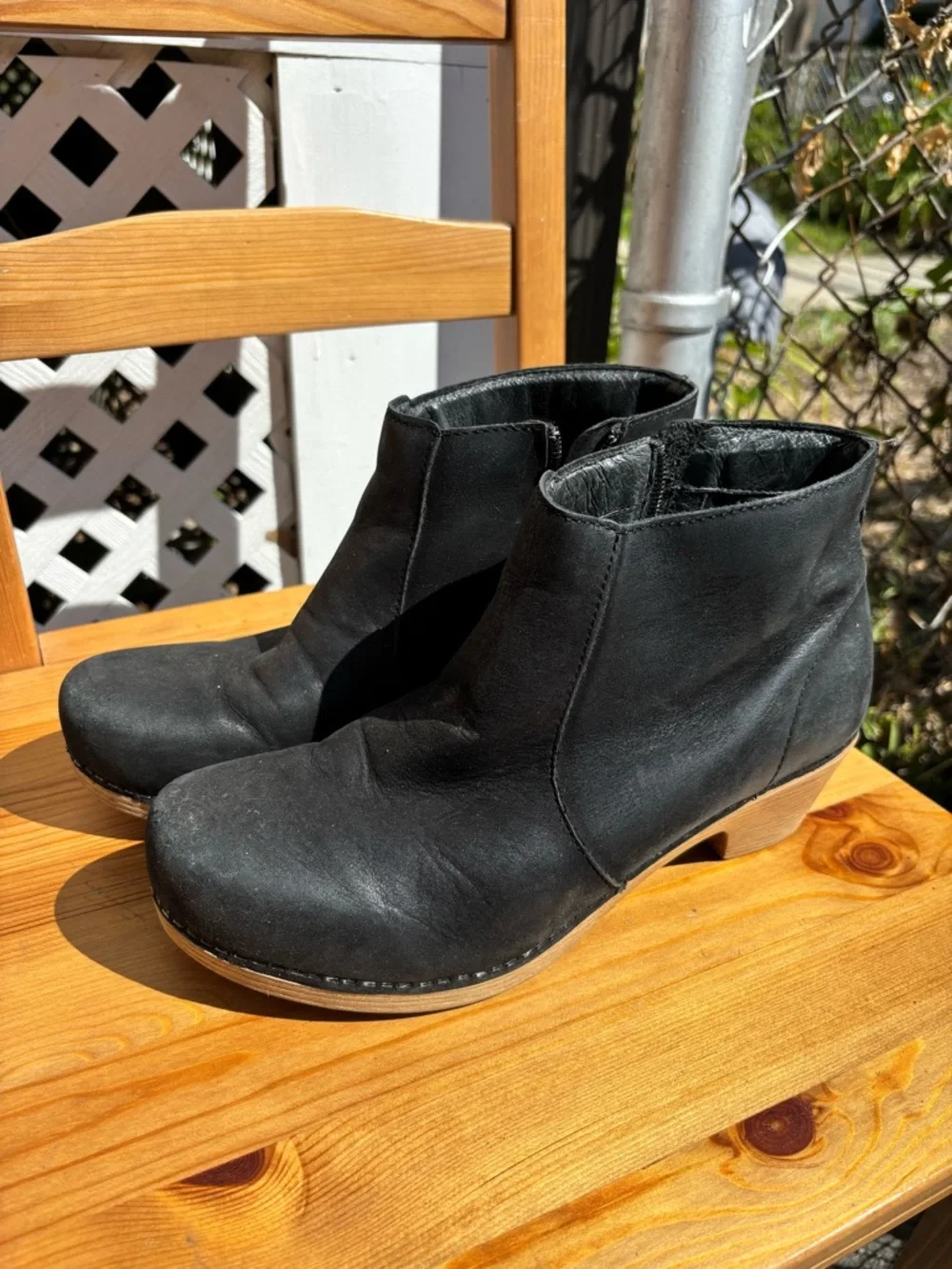 Dansko Black Leather Ankle Booties with Natural Wood-Look Heel